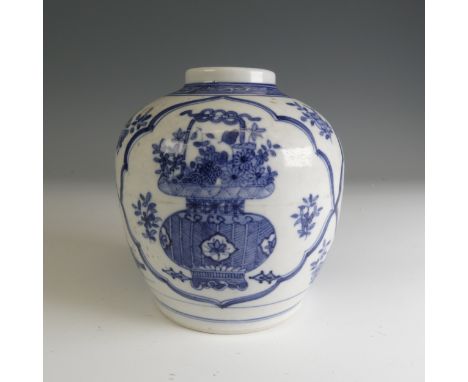 A late 19th/early 20thC Chinese blue and white Ginger Jar, decorated with floral baskets within scalloped cartouche H 13cm.Pr