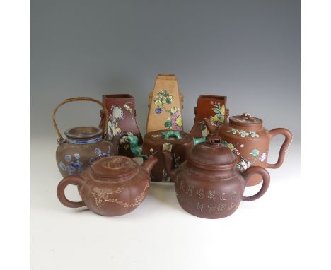 An early 20thC Chinese Yixing pottery Teapot, decorated overglaze in colourful enamels with four character mark to base, H 13