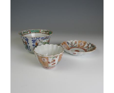 A 19thC Chinese famille verte porcelain Teabowl, decorated in prunus and fauna interspersing figures supporting large ornamen