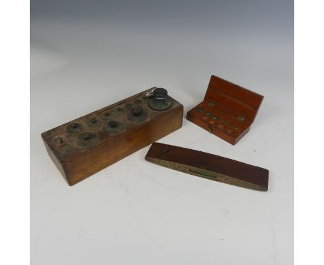 An antique Cast Iron and Brass Rabone Spirit Level, together with another Level, a set of Oertling scale weights and another 