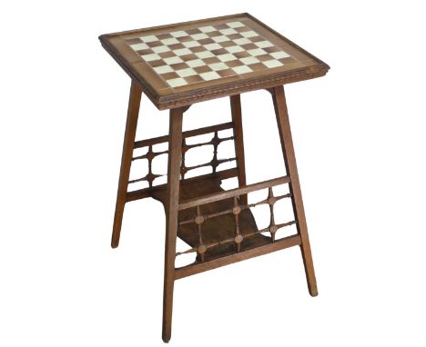 An unusual Arts and Crafts oak tile top Table, probably by Shapland and Petter of Barnstaple, with sixty-four square tiles cr