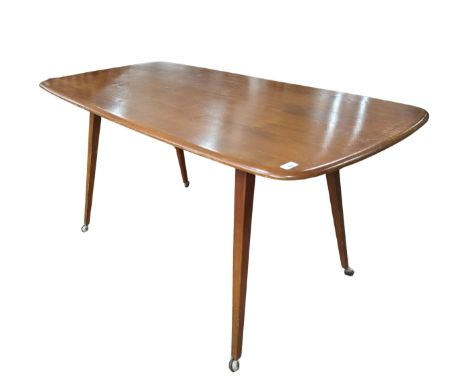 A mid-20th century Ercol blond beech and elm refectory dining Table, circa&nbsp;1960 model '755', having chamfered edges with