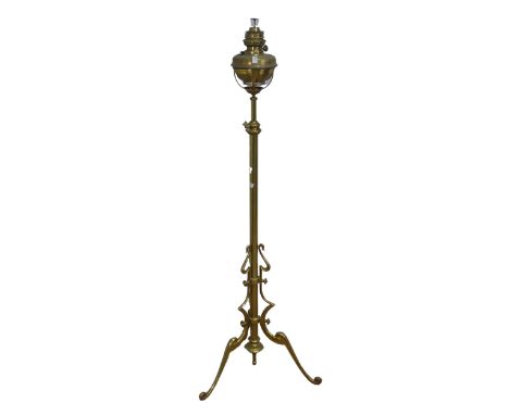 An early 20th century Art Nouveau style brass standard Oil Lamp, stamped 'Manufactured in Germany for S P Catterson London S 