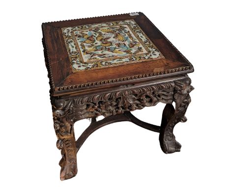 An unusual antique Chinese carved hardwood tile top side Table / Plant Stand, square top inset with Chinese tile depicting bu