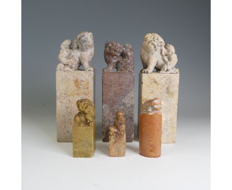 A small quantity of Chinese soapstone Seals, to comprise three of large size, each with Foo Dog finial, two incised with scri