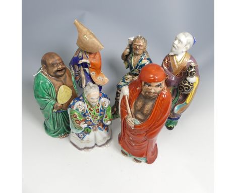 A quantity of 20thC Chinese pottery and porcelain Figures, mainly depicting elders, some marked to base, the samllest: H 12cm