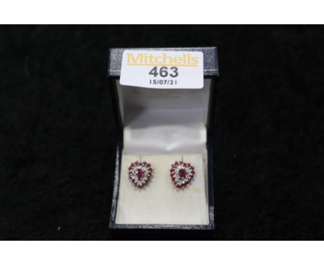 Pair of Ruby and Diamond stud earrings 