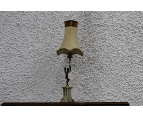 Decorative table lamp with shade with figural figure on onyx base 