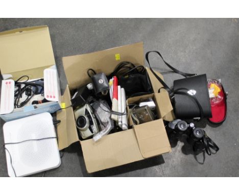 Pair of binoculars, digital camera, 35 mm cameras, etc. 