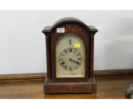 Early 20th century mantle clock with inlaid case 