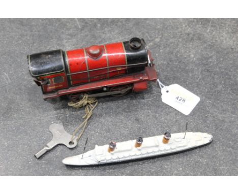 Hornby tin plate 0 gauge clockwork locomotive and a diecast cruise ship model by Crescent   