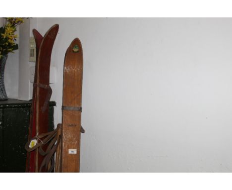 A set of vintage German skis and poles 