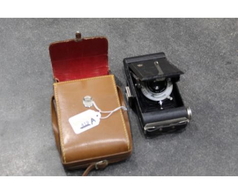 Box camera in leather case 