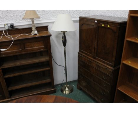 A brass effect lamp standard 
