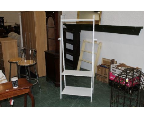 A modern white clothes rack with shelf storage below, measuring 165 cm tall &amp; 65 cm wide 