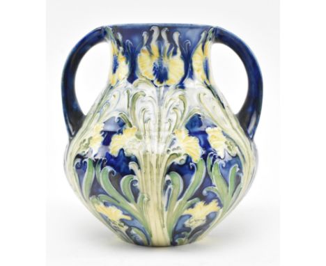 William Moorcroft (1872-1945) for MacIntyre &amp; Co. - a 1903 Florian Ware tube lined glazed ceramic twin handled vase in th