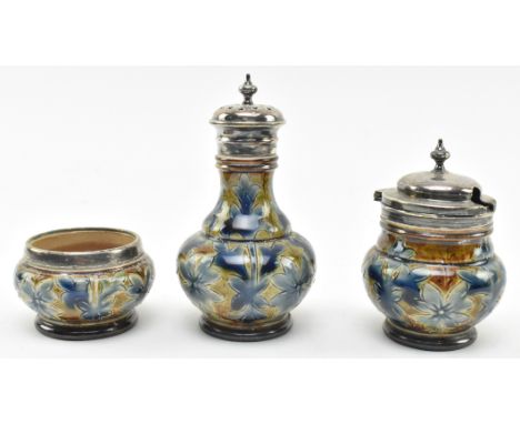 Doulton Lambeth - a Victorian late 19th century circa 1881 stoneware glazed ceramic cruet set. The set comprising of a sugar 