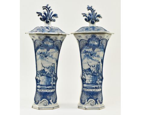 A pair of mid 18th century c1760 Dutch Delft blue and white trumpet vases. Each vase of trumpet form featuring central hand p