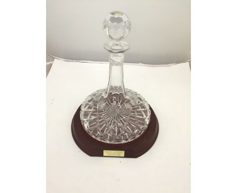 A ship's decanter and stand
