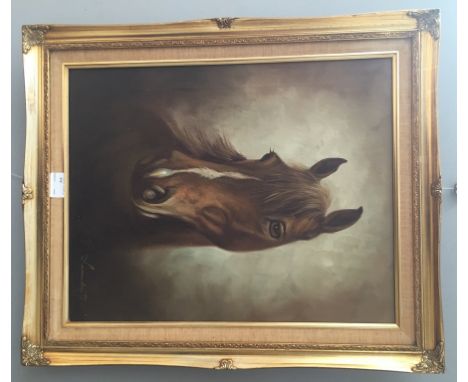 A portrait of a horse, oil on canvas, signed lower right, 49 x 39 cm