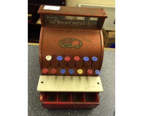 A vintage Codex toy cash register
