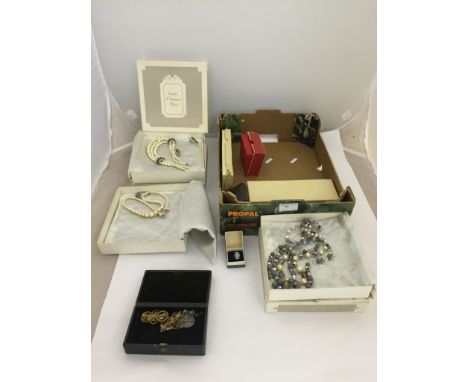 A quantity of cased vintage dress jewellery; together with three cased Christian Dior Bijou necklaces