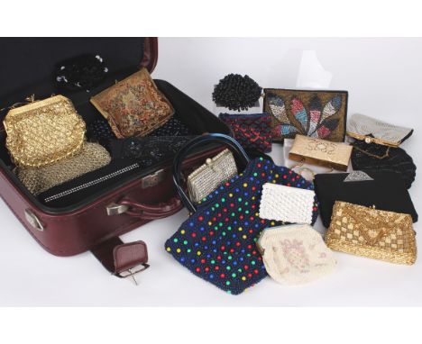 A collection of evening bags, including: a 1930s bead bag of French origin, a black silk devoré bag, a 1930s diamante bag, a 