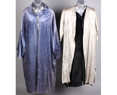 A Marshall & Snelgrove 1920s blue velvet coat, a 1950s gold brocade evening coat, a black silk velvet dress, a blue reversibl