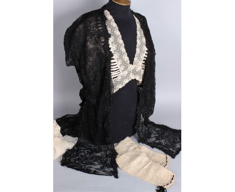 A 19th Century black and white paper taffeta two-piece costume with matching sash, a black taffeta fringed bodice with black 