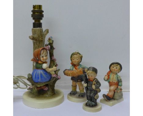 A Goebel Apple Tree Girl lamp base and three Goebel figures, two a/f (4)