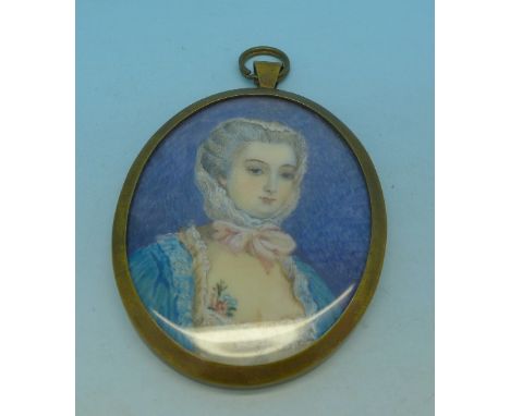 An oval framed portrait miniature, 66mm x 53mm