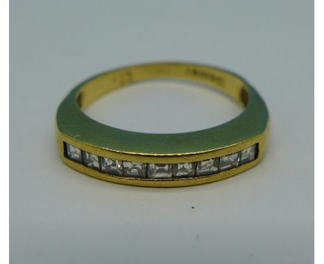 An 18ct gold and diamond ring, 0.33 carat diamond weight, 2.7g, K