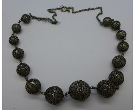 A silver filigree necklace