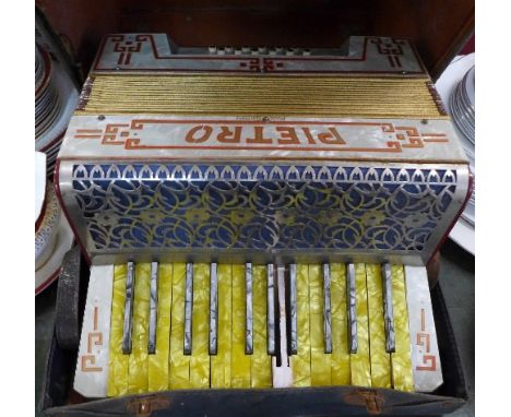 A Pietro Germany piano accordion, cased, a/f