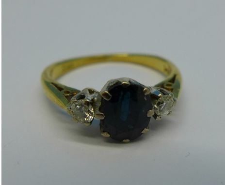 An 18ct gold, diamond and sapphire ring, 2.9g, K