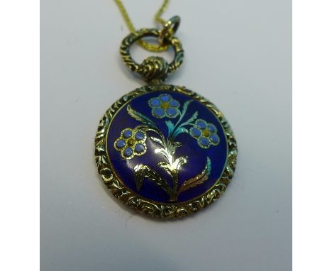 An enamel locket on a 9ct gold chain, weight of chain 1.9g