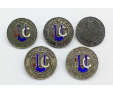 Four silver and enamel badges by Mappin & Webb, 'Handicap S.A.', and one other similar badge in metal, 42g