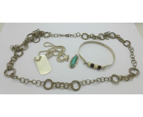 A sterling silver bangle set with wood and ivory, a .925 silver chain and pendent, a sterling and turquoise pendant and a .80