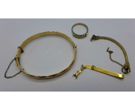 A 9ct gold ring, a 9ct gold tie-pin, a rolled gold bangle and a plated part watch strap, weight of 9ct 5g, ring a/f