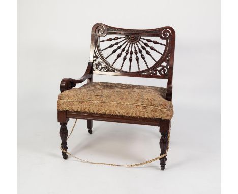 ARTS AND CRAFTS CARVED MAHOGANY AND STAINED FRUITWOOD OCCASIONAL/ NURSING CHAIR, the low back with radiating spindled and pie