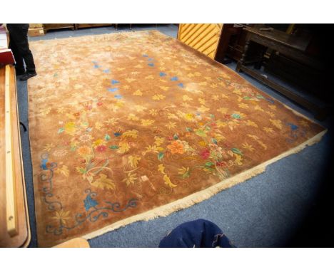 LARGE AND HEAVY QUALITY WASHED CHINESE CARPET with light brown field, having pattern of fine line scrolls with large, mainly 