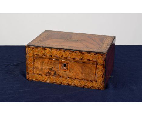 LATE VICTORIAN FIGURED WALNUT AND TUNBRIDGE BANDED SEWING BOX, of oblong form, the hinged cover with central, oblong brass ca