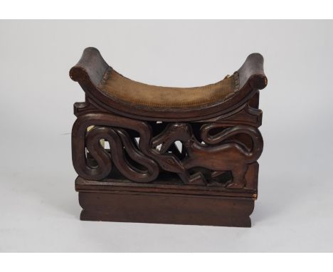 EARLY TWENTIETH CENTURY AFRICAN CARVED HARDWOOD NARROW STOOL CARVED WITH THE NAME ?ROBERT GRAY, DUALA?, the traditional shape