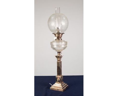 ELECTROPLATED CORINTHIAN COLUMN OIL TABLE LAMP, of square form with captive lion mask ring handles to the steeped base, cut g