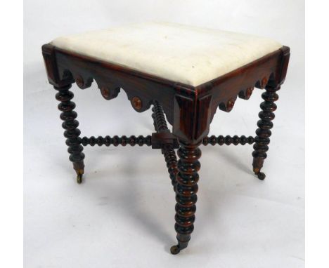 VICTORIAN FOOTSTOOL GRAIN PAINTED AS ROSEWOOD, the drop-in, padded oblong top covered in white calico, set above a shaped fri
