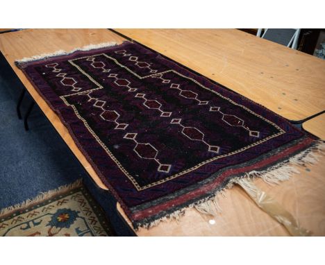SHIRAZ, PERSIAN GEOMETRICAL PRAYER RUG with three rows of white stencilled hexagonal medallions with pendants, white outlined