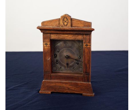 SMALL, EARLY 20th CENTURY, ARTS &amp; CRAFTS DESIGN INLAID OAK MANTEL ALARM CLOCK with 8 days spring driven movement striking