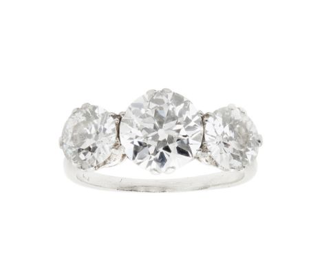 A three stone diamond set ringclaw set with three graduated round cut diamonds, to a plain unmarked white metal shankRing siz