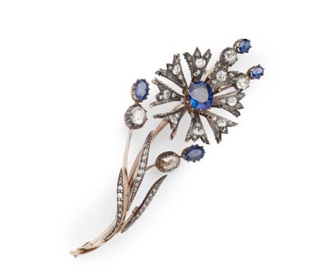 A Victorian sapphire and diamond set floral spray broochthe principal en tremblant flowerhead set with a central cushion cut 