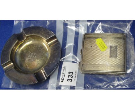 Silver ashtray and small silver engine turned compact. (2)